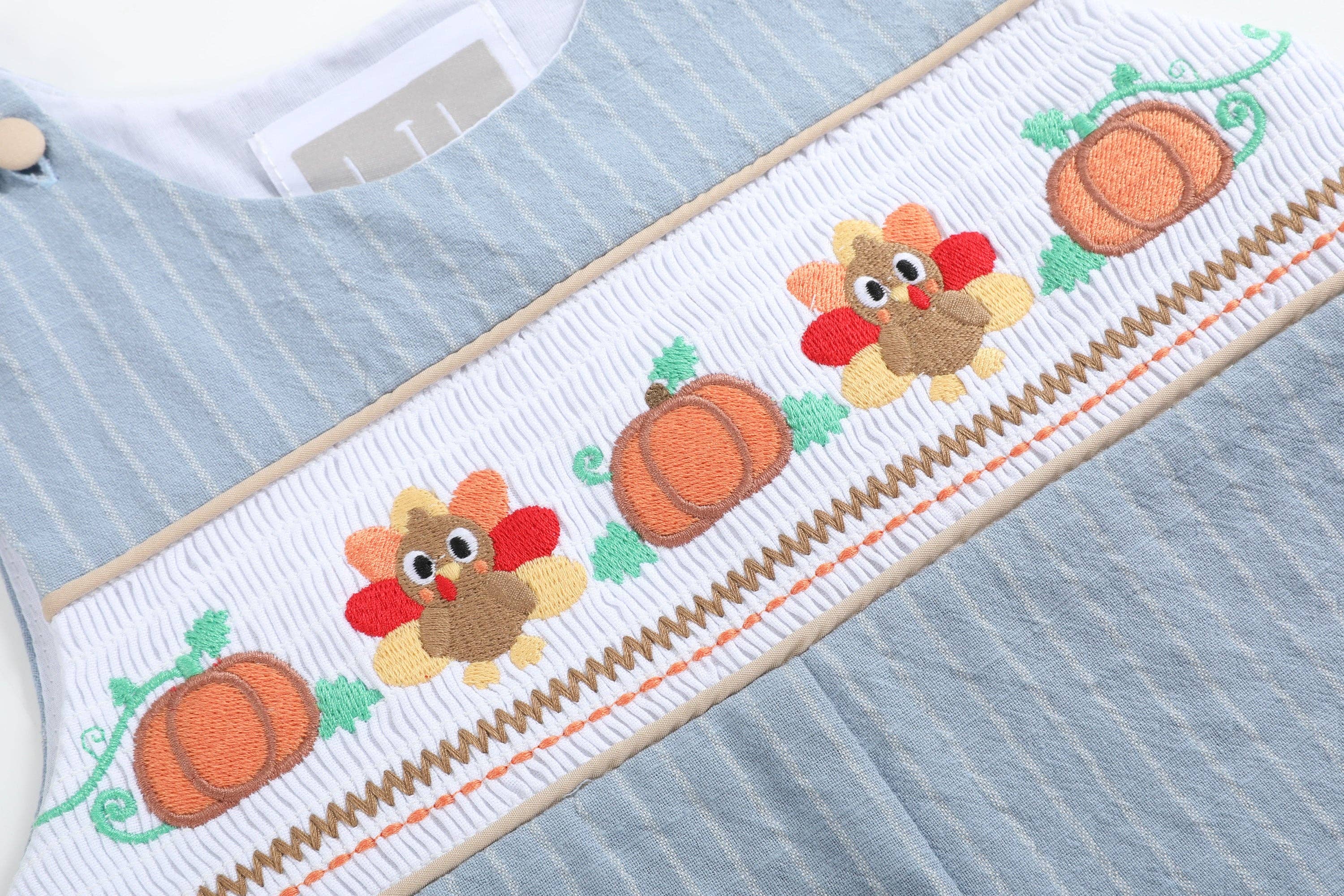 Light Blue Pinstripe Turkey Smocked Overalls - Premium  from Lil Cactus - Just $36! Shop now at Pat's Monograms